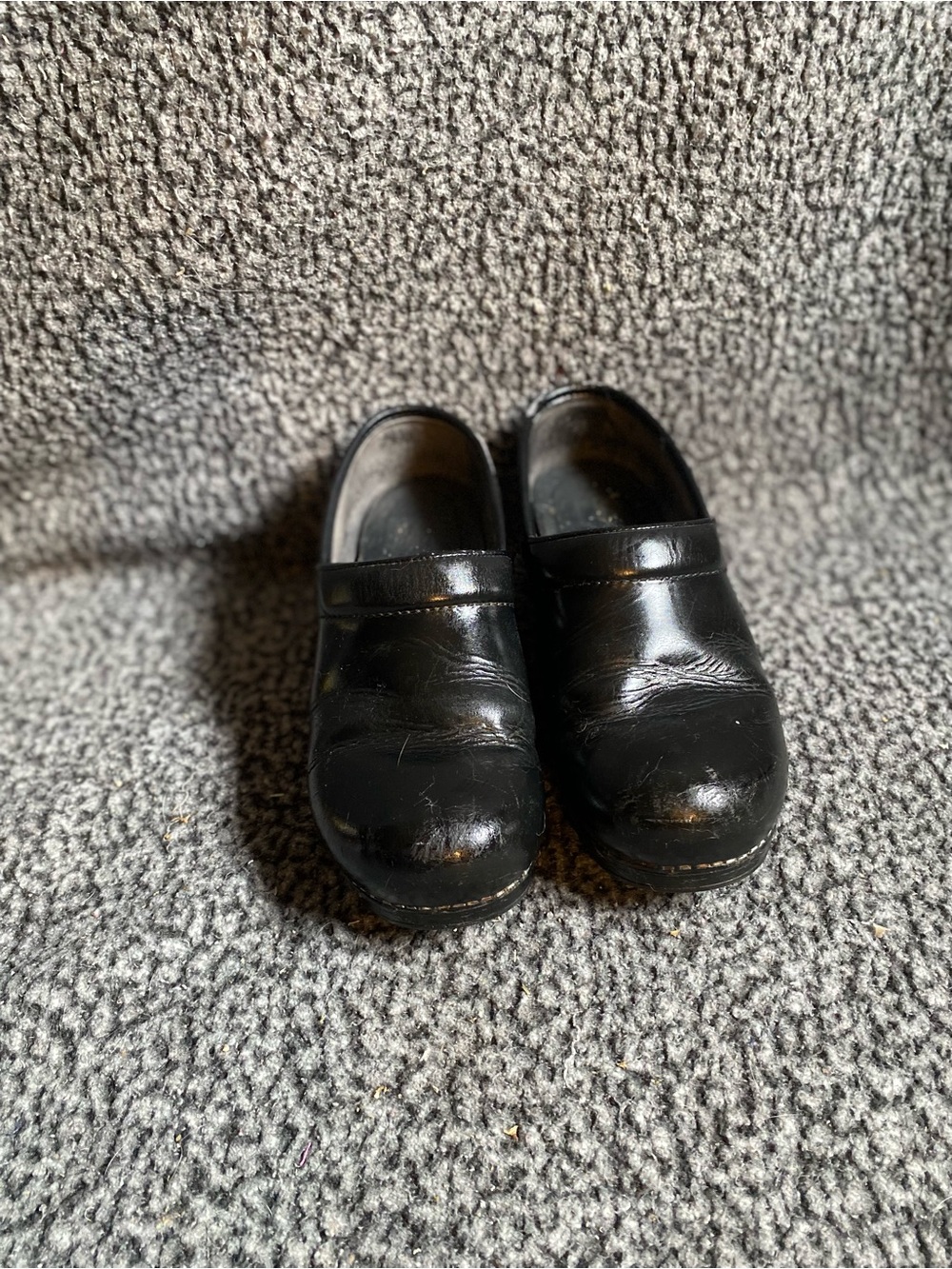 Dansko Black Leather Slip-On Clogs